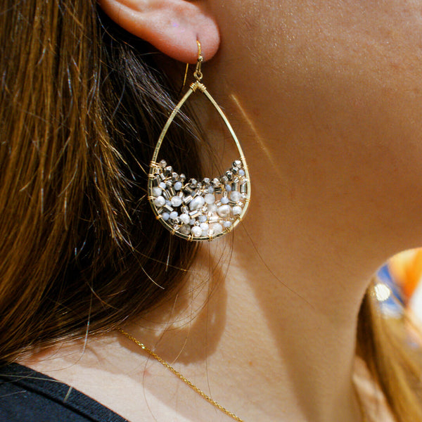 Boucles d'oreilles Las Vegas. Boucles d'oreilles pendante femme demi cercle, en vente chez Naode Paris, boutique de bijoux à Paris 17